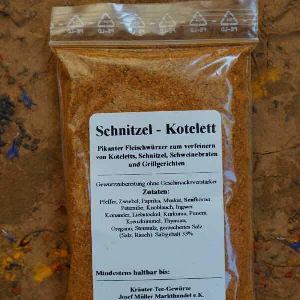 Schnitzel-Gewürzzubereitung mit rötlichen, gelblichen und grünen Bestandteilen
