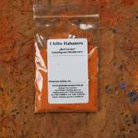Chili Habanero als feines, kräftig rotes Pulver